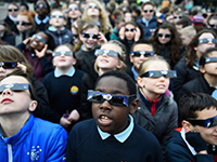 Kids wearing eclipse shades